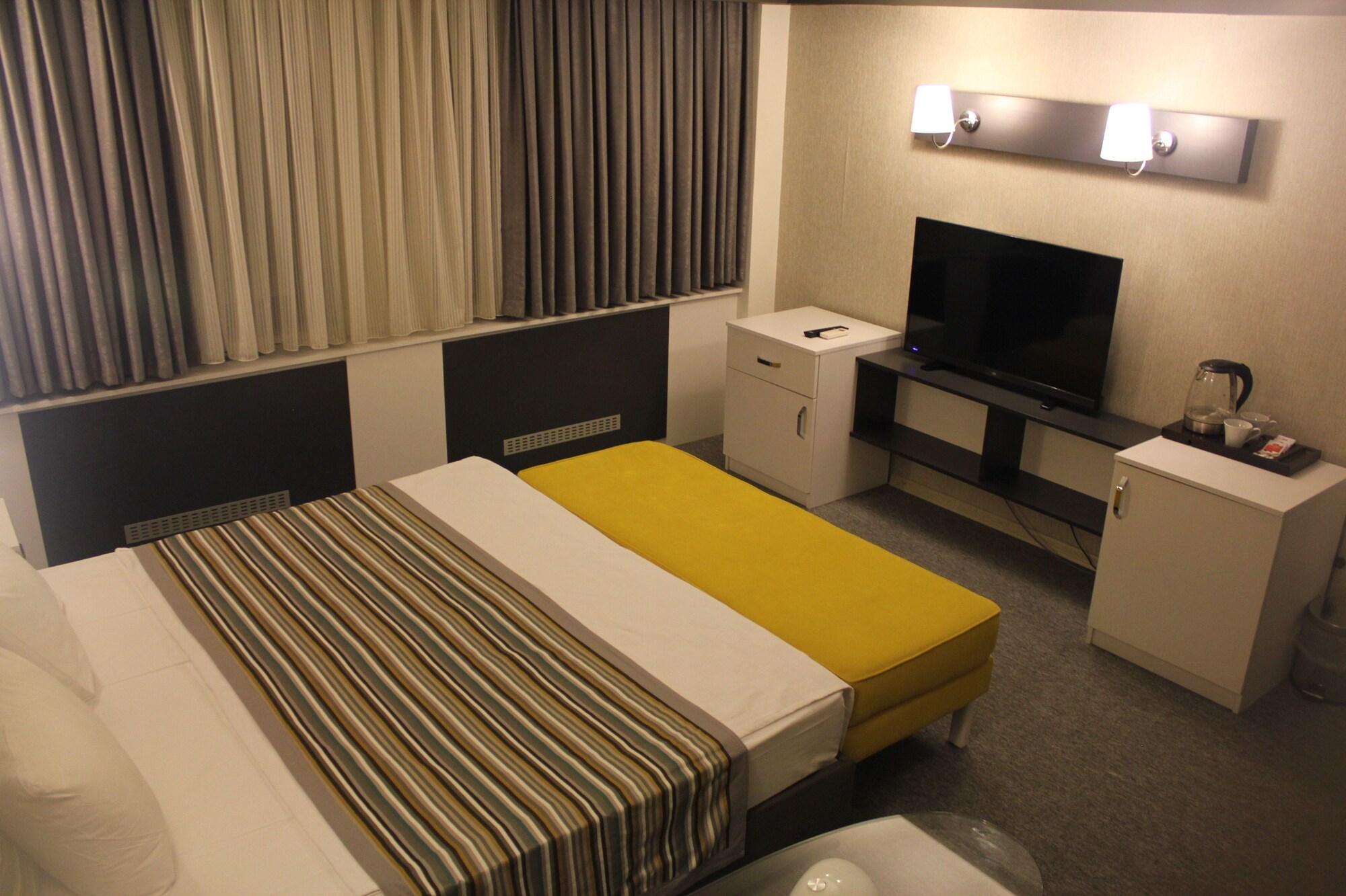 Hotel Taksim Home Стамбул Экстерьер фото