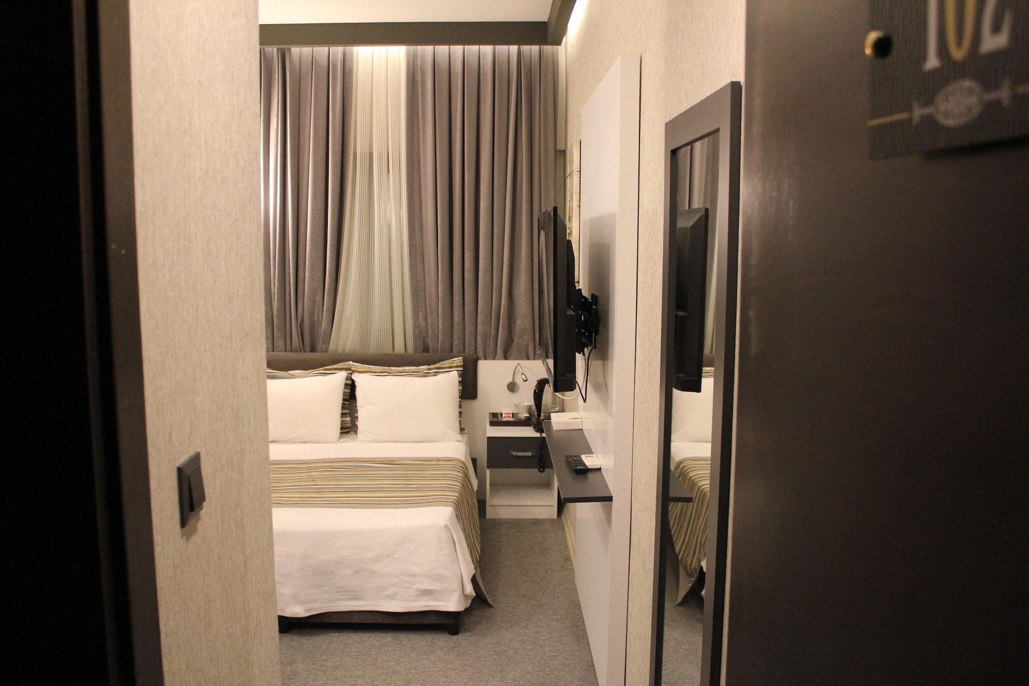 Hotel Taksim Home Стамбул Экстерьер фото