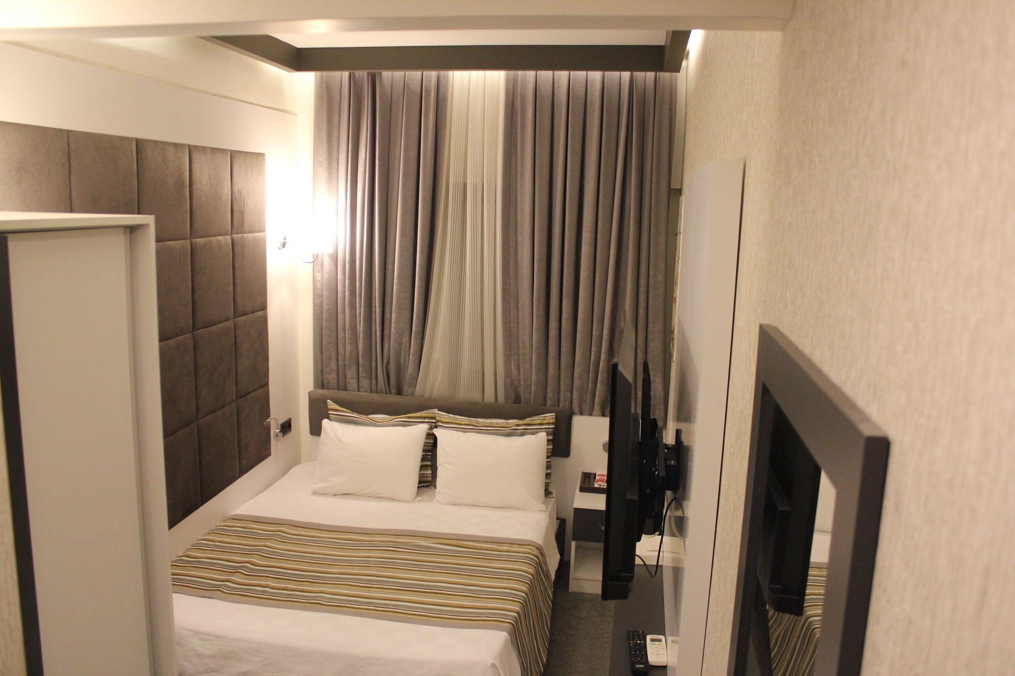 Hotel Taksim Home Стамбул Экстерьер фото